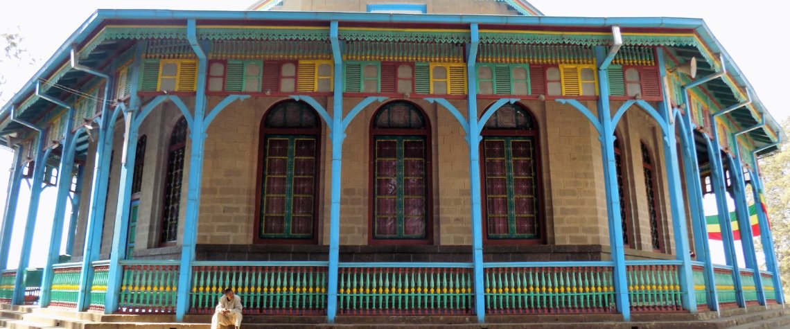 This photo shows the distinctive blue facade ofEntoto Maryam Church