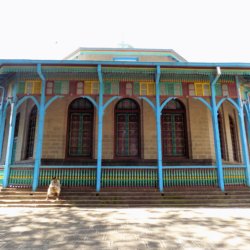 This photo shows the distinctive blue facade ofEntoto Maryam Church