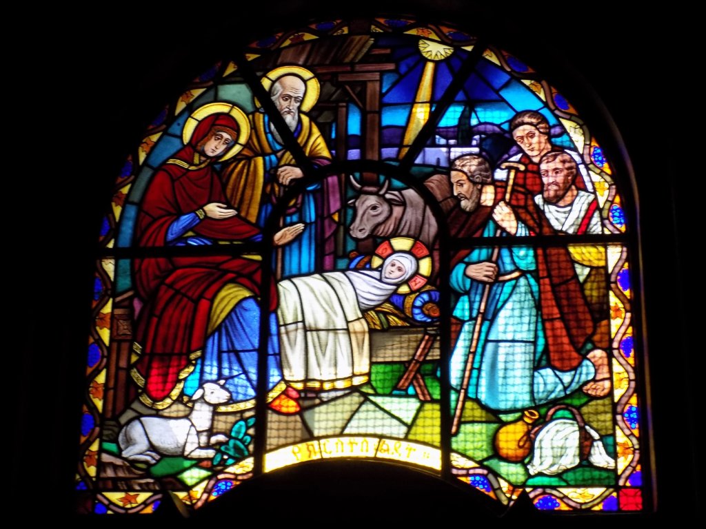 This photo shows a beautiful stained glass window depicting the story of the nativity