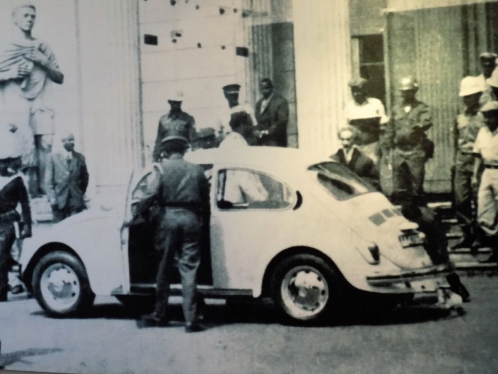 This photo shows Selassie being taken away by the Derg. They used a VW Beetle to humiliate him.