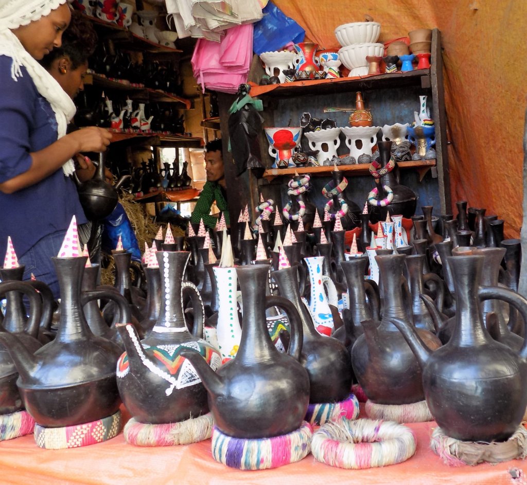 This photo shows lots of black Ethiopian coffee pots