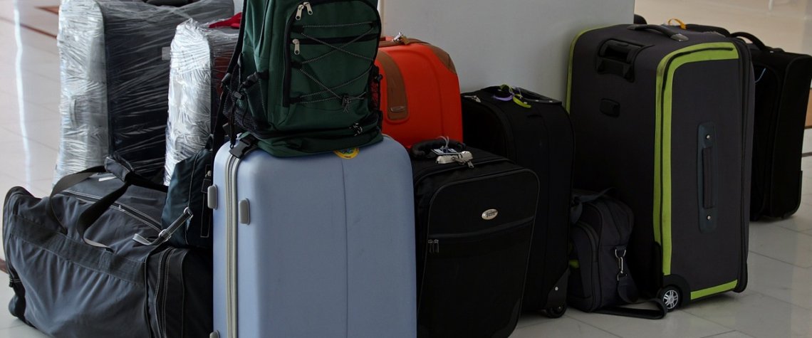 This photo shows a collection of unclaimed bags in an airport