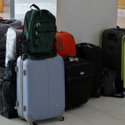 This photo shows a collection of unclaimed bags in an airport