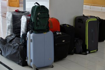 This photo shows a collection of unclaimed bags in an airport