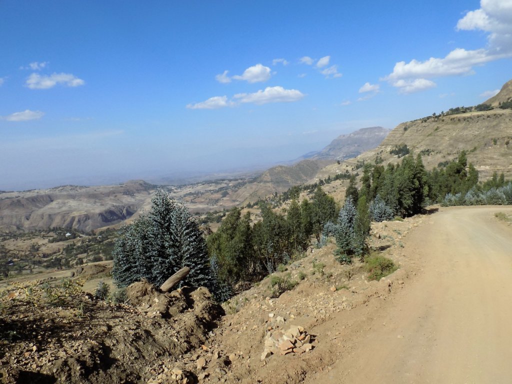 This photo shows the dry landscape of rural Ethiopia set against a brilliant blue sky