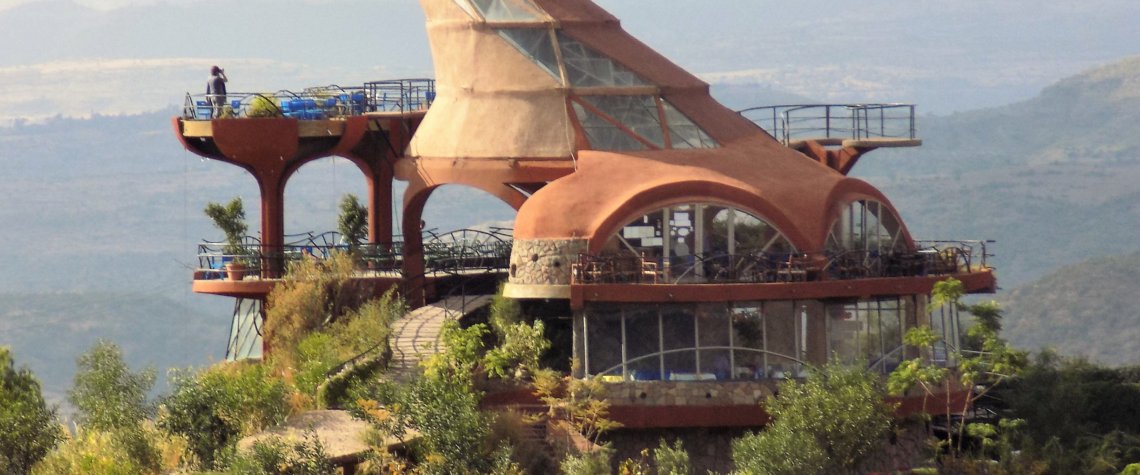 This photo shows the Ben Abeba restaurant viewed from the road out of Lalibela. The quirky architecture which got the restaurant its nickname can clearly be seen.