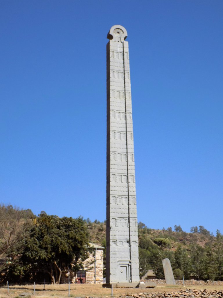 This photo shows the very tall Stele 2 set against a brilliant blue sky