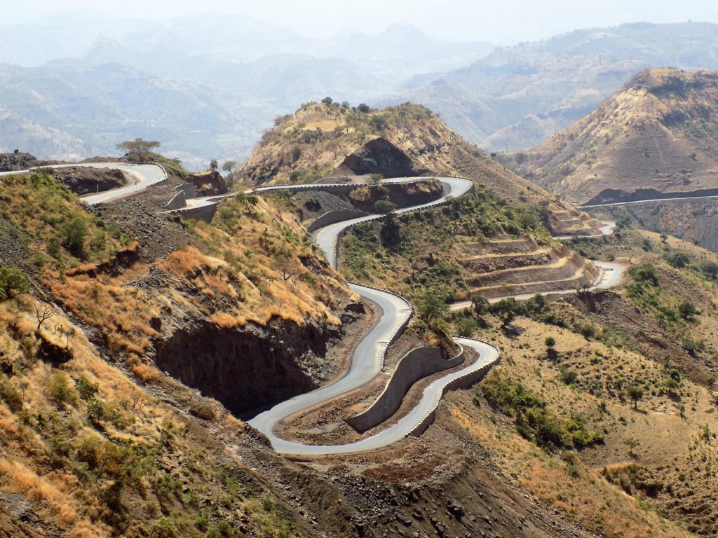 This photo shows an incredible road winding its way around the mountains