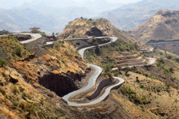 This photo shows an incredible road winding its way around the mountains