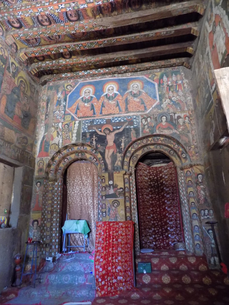 This photo shows the inside of Debre Berhan Selassie Church with its beautiful religious paintings on the walls