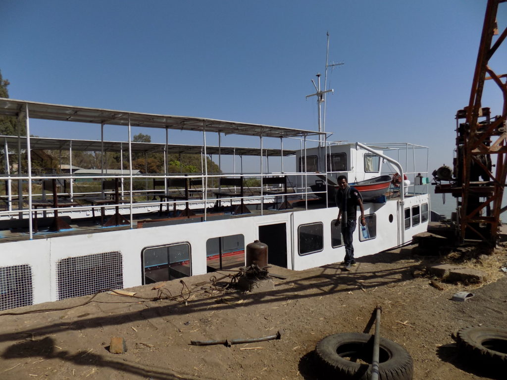 This photo shows the empty ferry moored on the quayside at Gorgora.