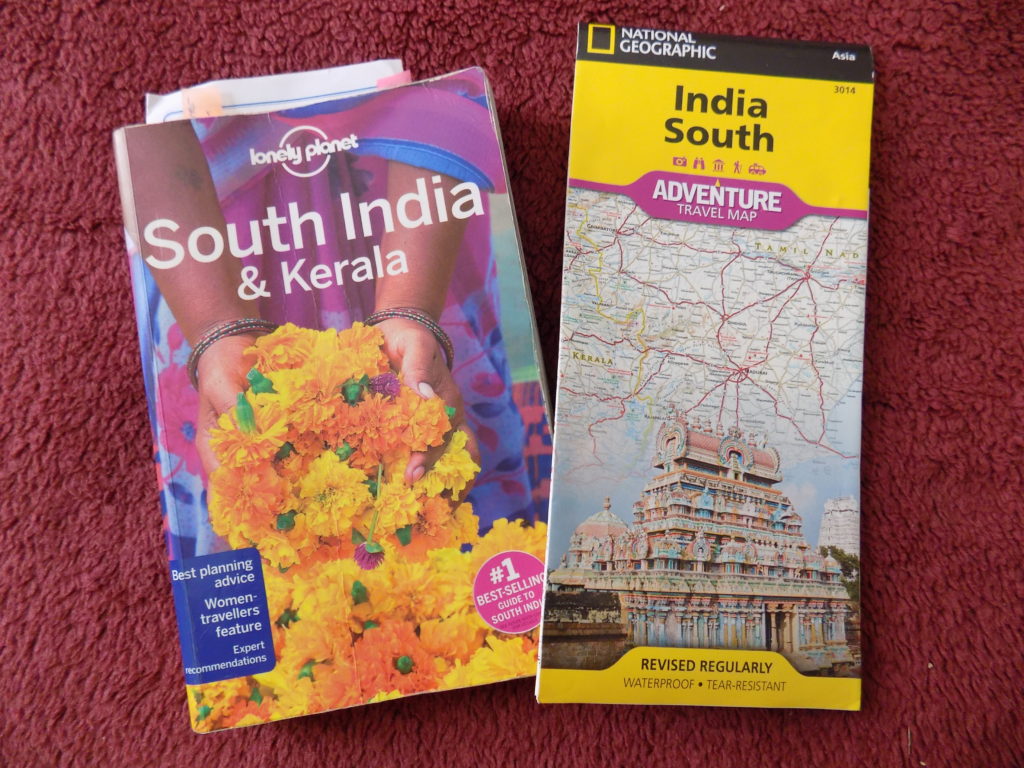 This picture shows the Lonely Planet guidebook to southern India and the National Geographic map of India South.