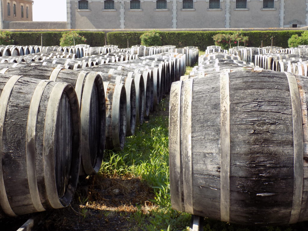 This picture shows hundreds of barrels outside in the sunshine
