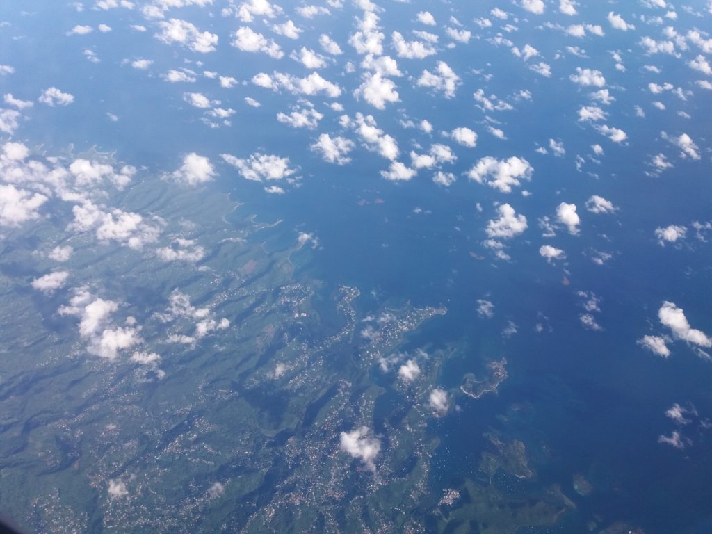 This image shows the island of Grenada. It was taken from the window on our flight from London Gatwick to Port of Spain, Trinidad. 