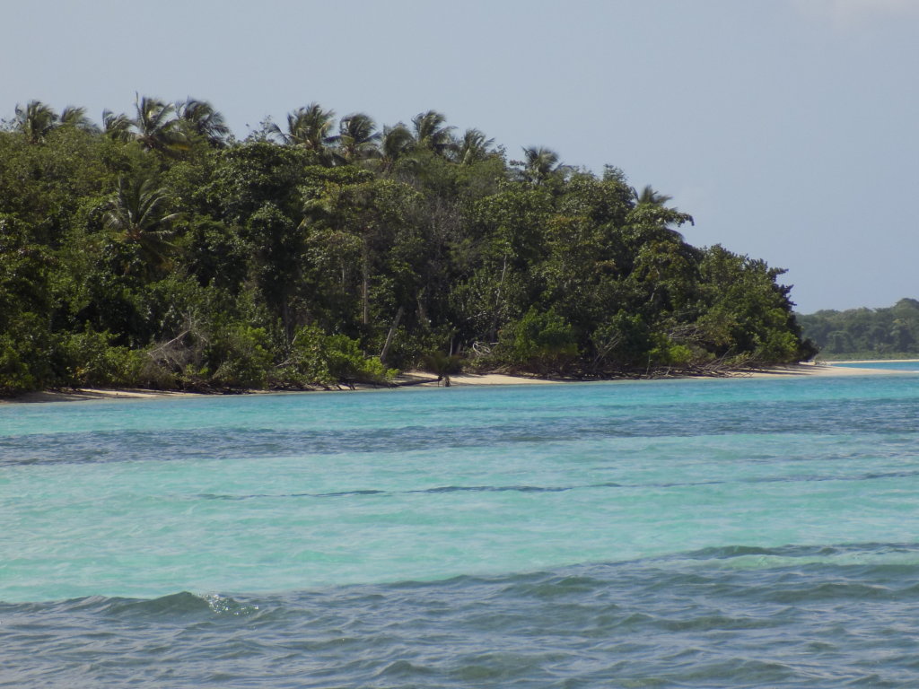 This photo shows No Man's Land beach and the crystal clear turquoise Caribbean Sea