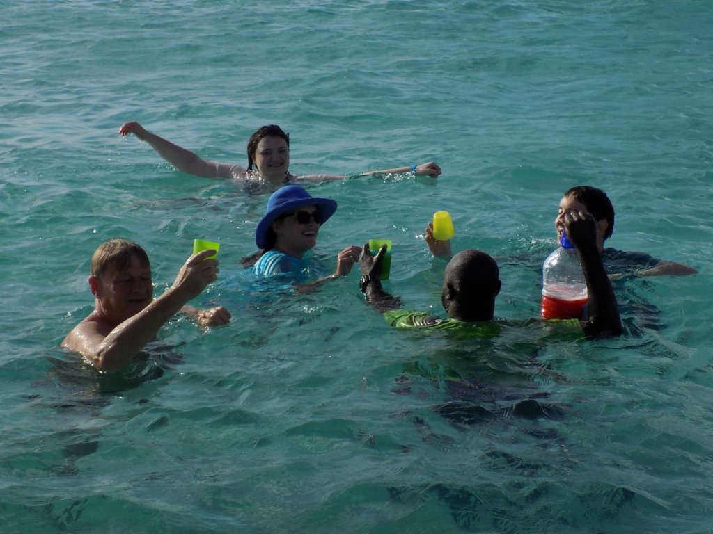 This phot shows Mark and other members of our group trying not to spill their rum punch in Nylon Pool.