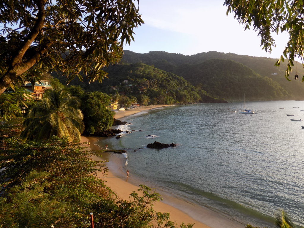 This photo shows both bays of Castara as seen from the Boatview Apartments