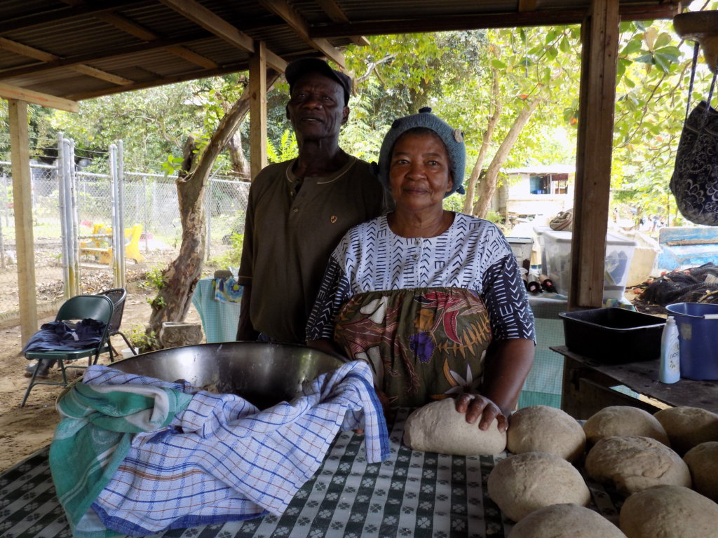 This photo shows Daddy Ben and Mrs Taylor with the bread dough ready to be baked