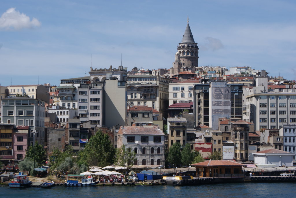 This photo shows the Galata Bridge in Istanbul with the Galata Tower in the background