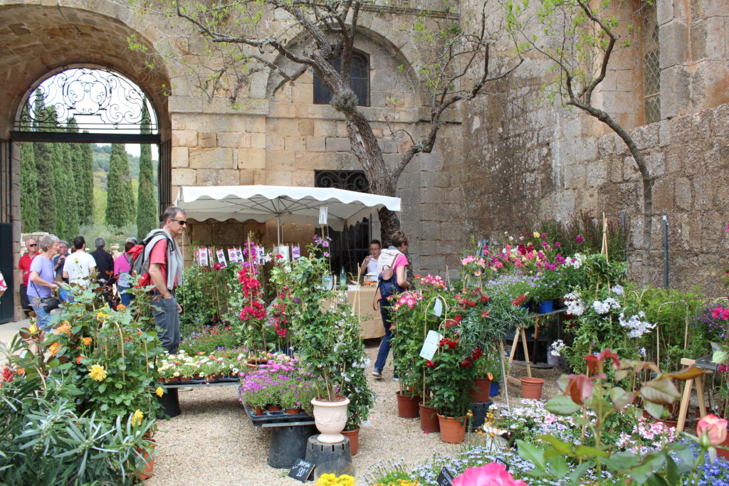This photo shows some plant stalls in the grounds of the Abbaye de Fontfroide