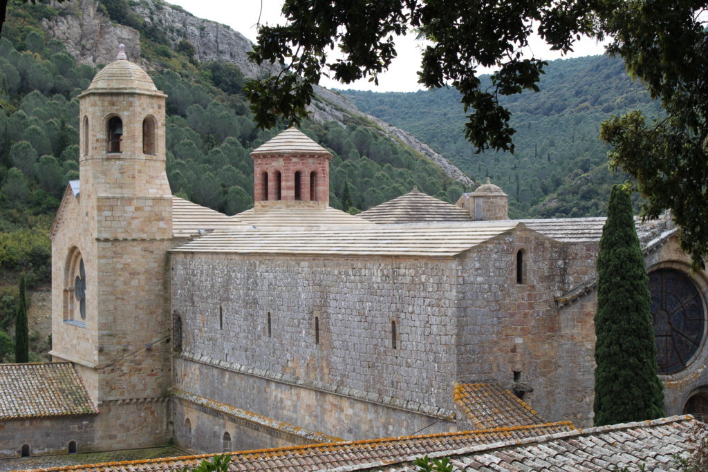 This photo shows the roofs and bell towers of the abbey viewed from the terraced gardens