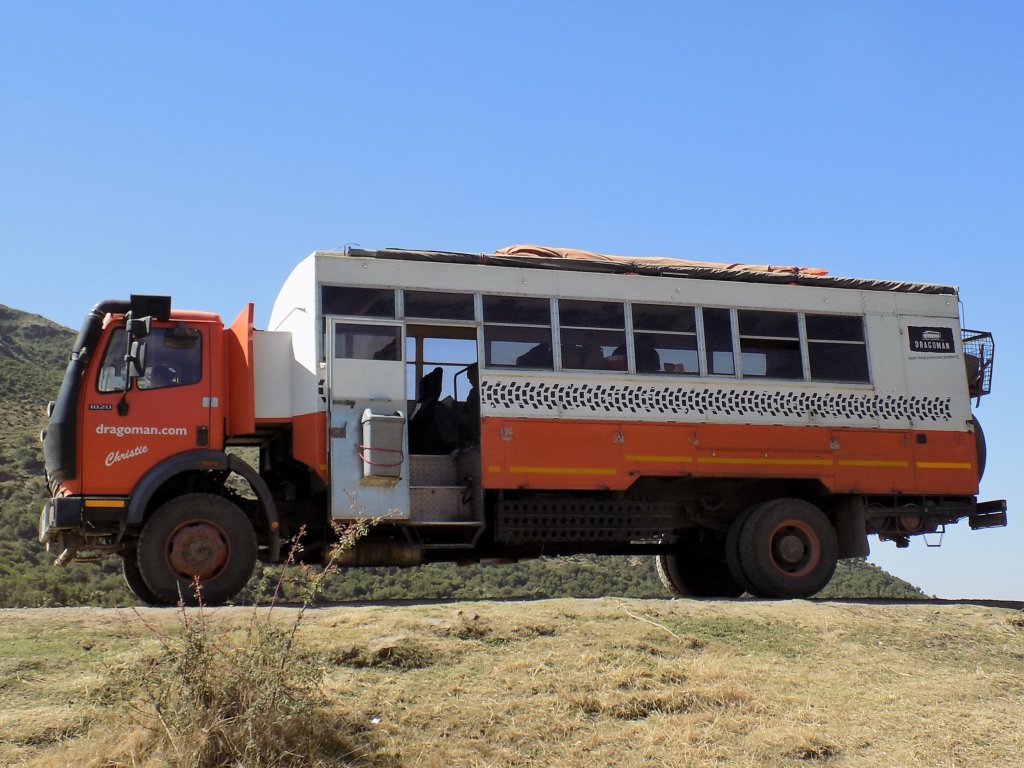 This picture shows the Dragoman truck on a road in the Simien Mountains.