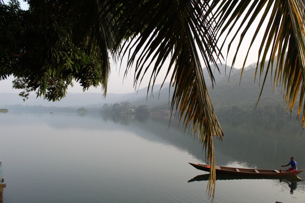 This photo shows Lake Volta in the dawn light. It's very still and calm.