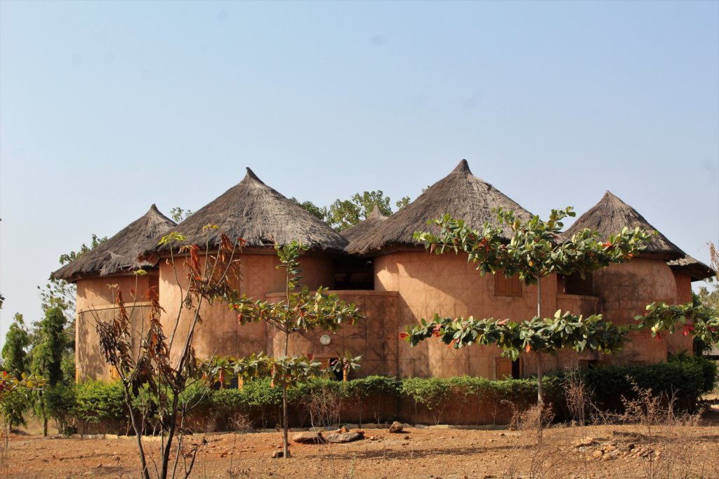 This photo shows our hotel in Benin, made up of several round buildings linked together 