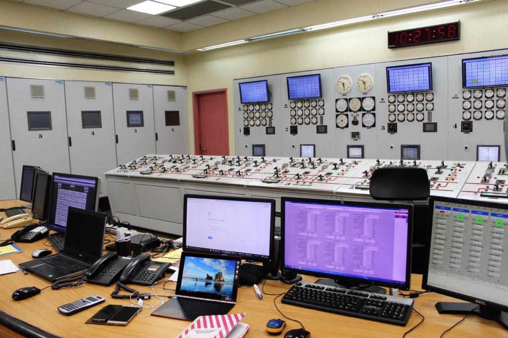 This photo shows the control room at the hydroelectric plant with banks of computers controlling everything