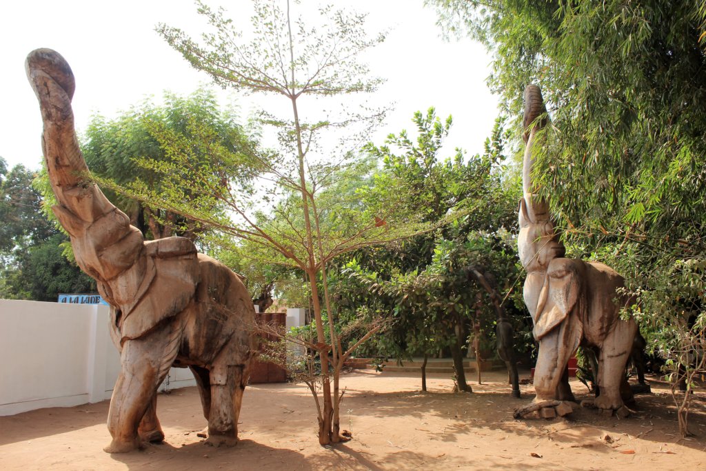 This photo shows two huge elephants carved from wood