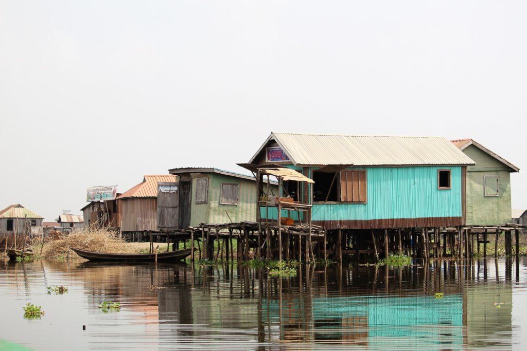 This photo shows the stilt houses on the water