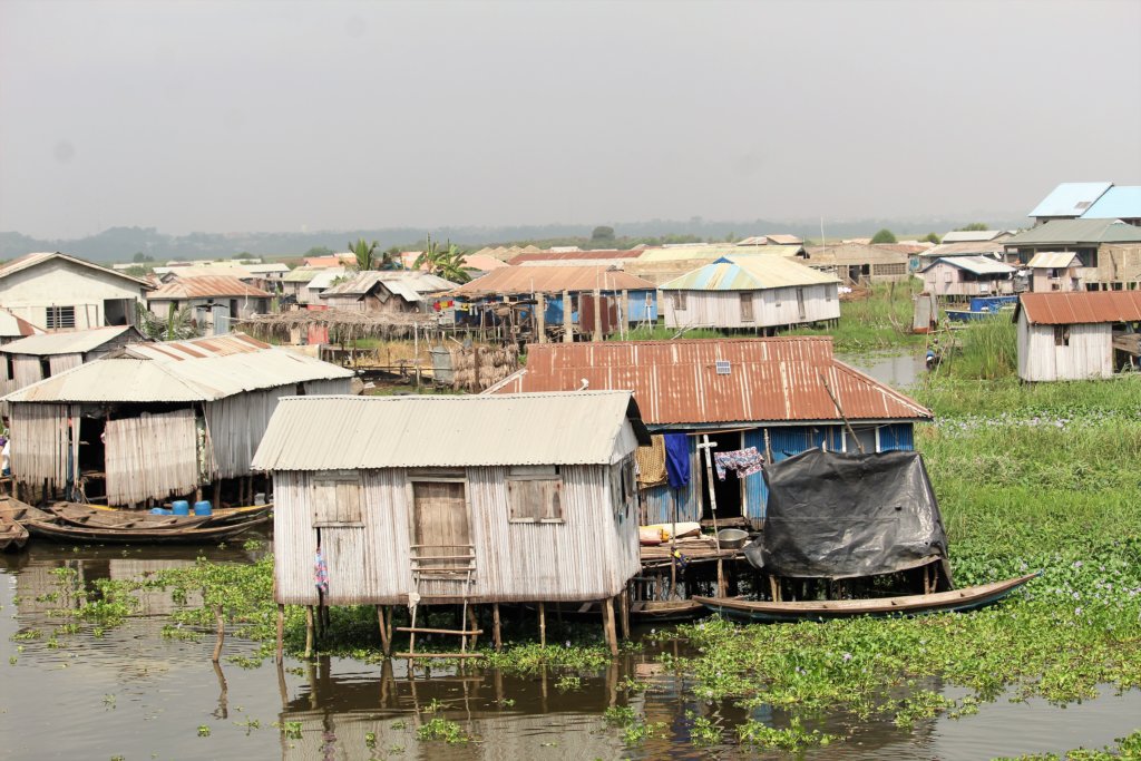 This photo shows the stilt houses on the water