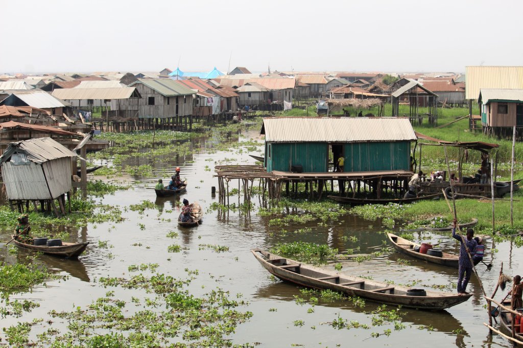 This photo shows the stilt houses on the water