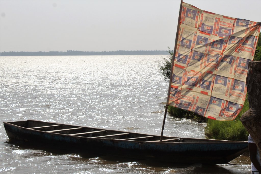 This photo shows our boat, complete with its cement bag sail