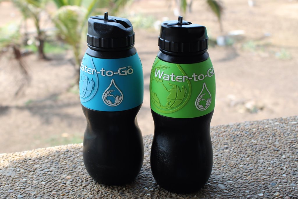 This photo shows our two water filter bottles - one green and one blue