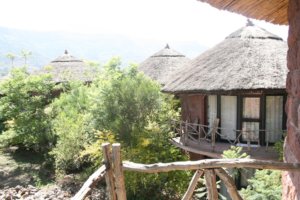 This photo shows some of the round accommodation units at Tukul Village