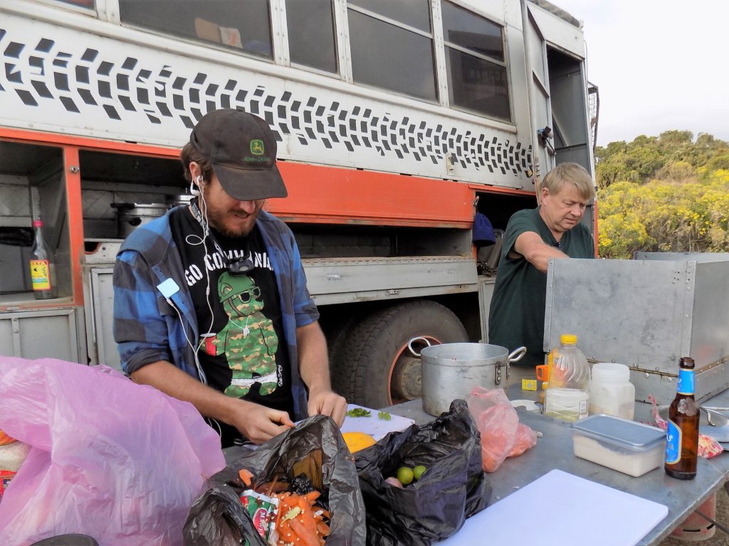 This picture shows my husband, Mark, and fellow passenger, Nick, preparing dinner for the group