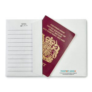 This photo shows an open travel wallet with a British passport sticking out of it