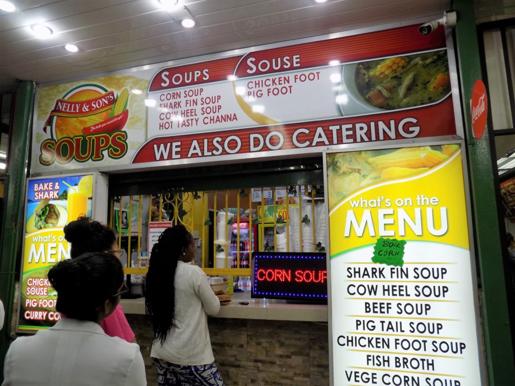 This photo shows a soup stall selling several varieties including cow heel, shark fin, corn, and pig tail