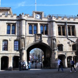 This photo shows the impressive Guildhall in Lincoln complete with its crenallated roof and archway leading to the High Street