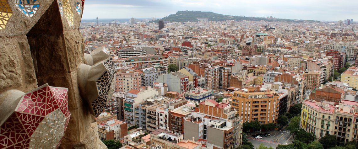 This photo shows the view of Barcelona from the Passion Tower including a decorative detail on the tower itself