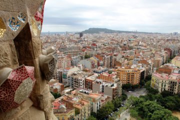 This photo shows the view of Barcelona from the Passion Tower including a decorative detail on the tower itself