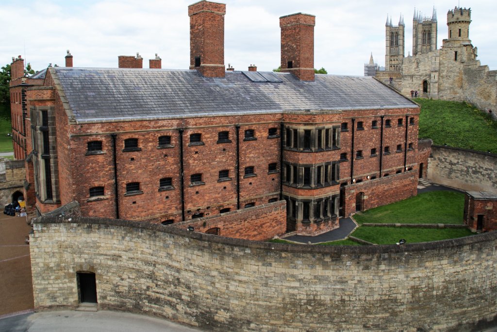 This photo shows the red brick Victorian prison located within the grounds of Lincoln Castle