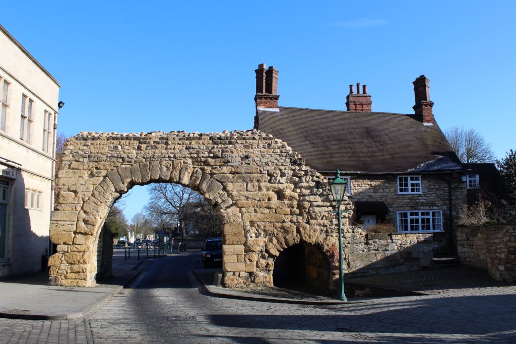 This photo shows the ancient Newport Arch set against a brilliant blue sky