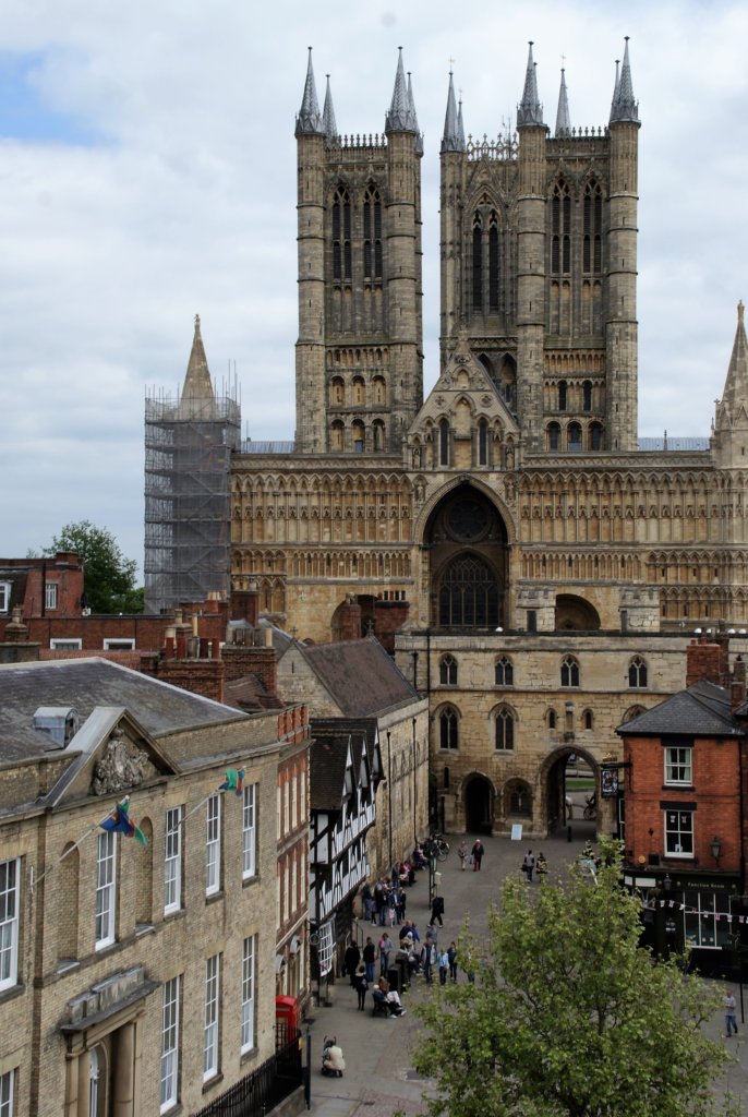 This photo shows the front facade of Lincoln Cathedral taken from the walls of Lincoln Castle