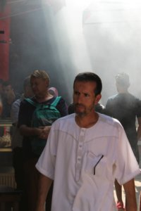 This photo shows our guide walking down camel street enveloped in the smoke from the barbecues