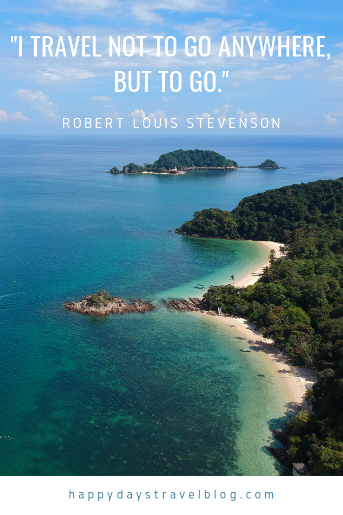 This photo shows the famous quote by Robert Louis Stevenson, 'I travel not to go anywhere but to go.' superimposed on a picture of a beautiful lush green island set in an azure sea.