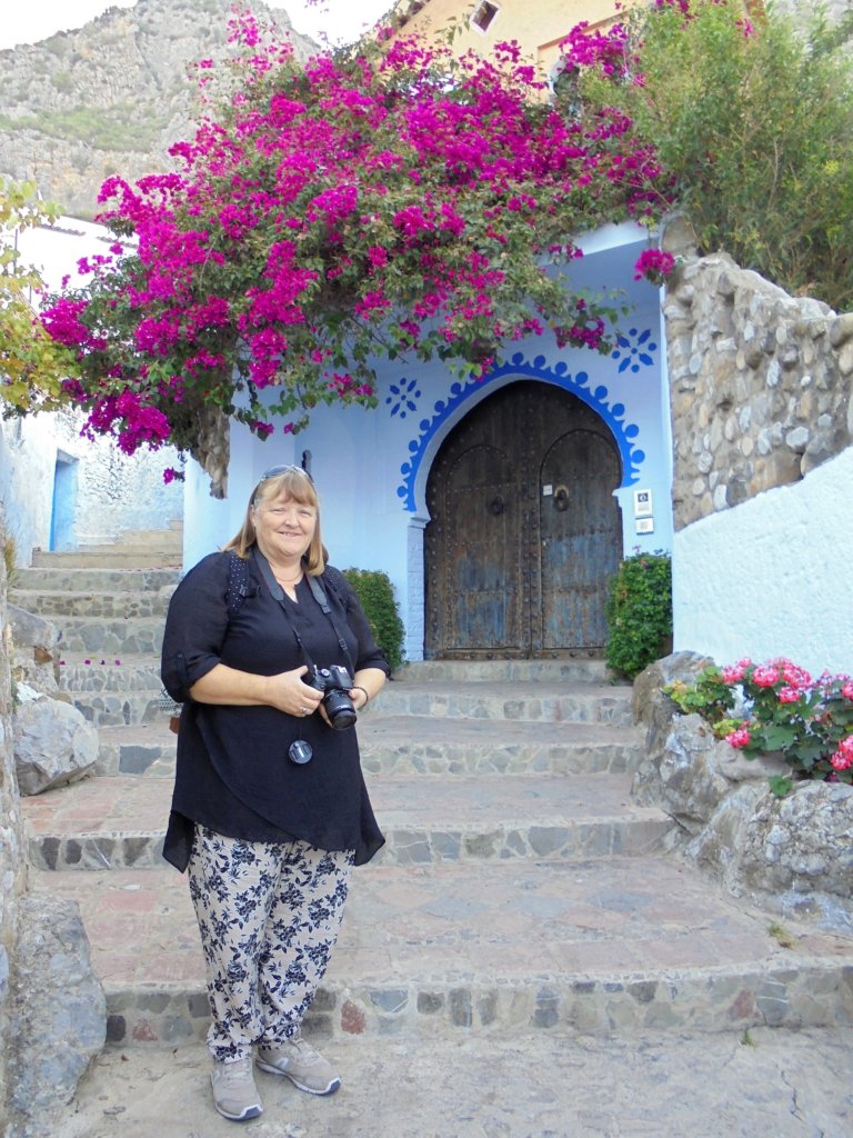 This is a photo of me outside the entrance to our hotel in Chefchaouen