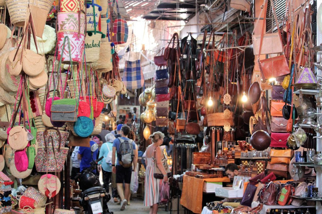 This phoot shiows stalls selling handbags, shoes and other leather goods