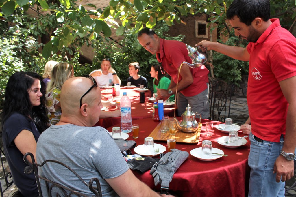 This photo shows our guide, Hamid, pouring tea from a great height into small glasses